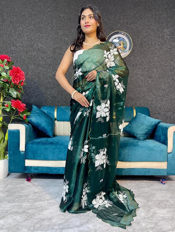 women solid with work embellished saree with blouse