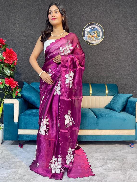 women solid with work embellished saree with blouse