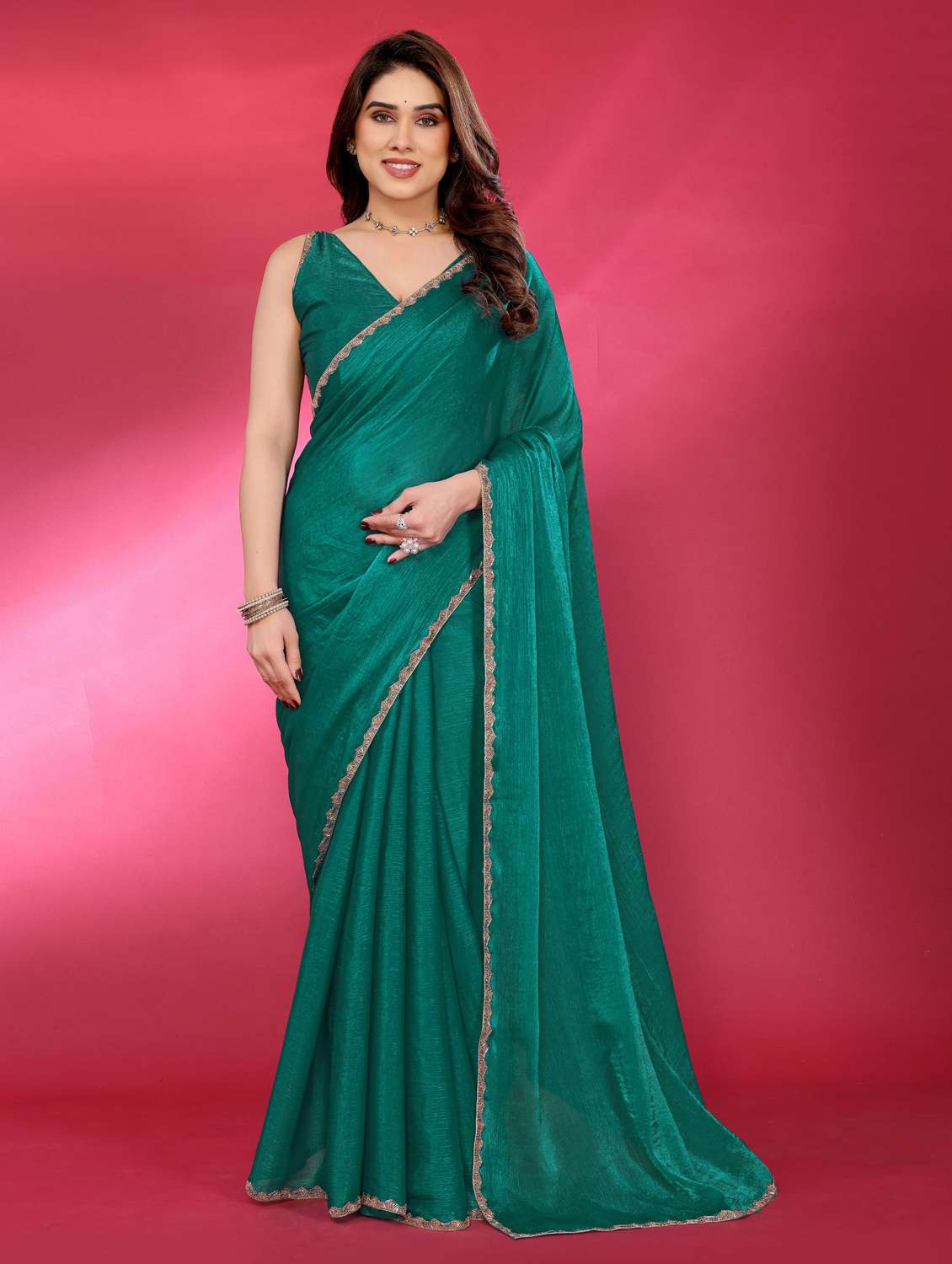 women solid with bordered embellished saree with blouse