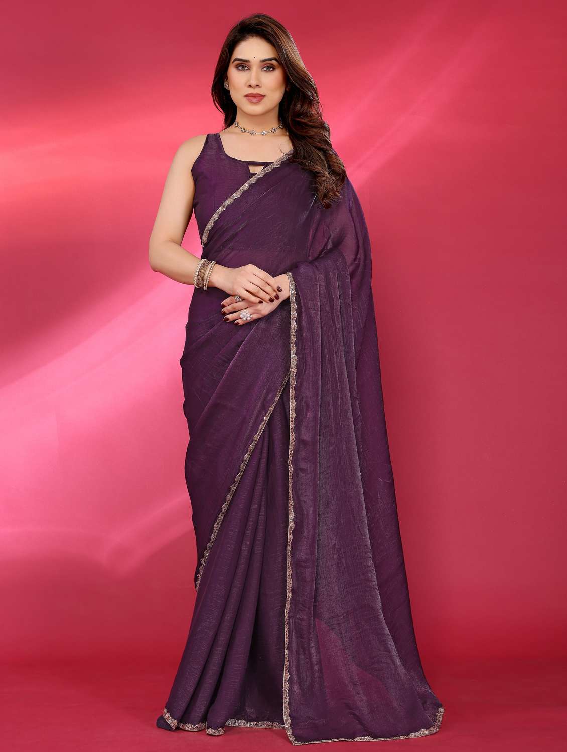 women solid with bordered embellished saree with blouse