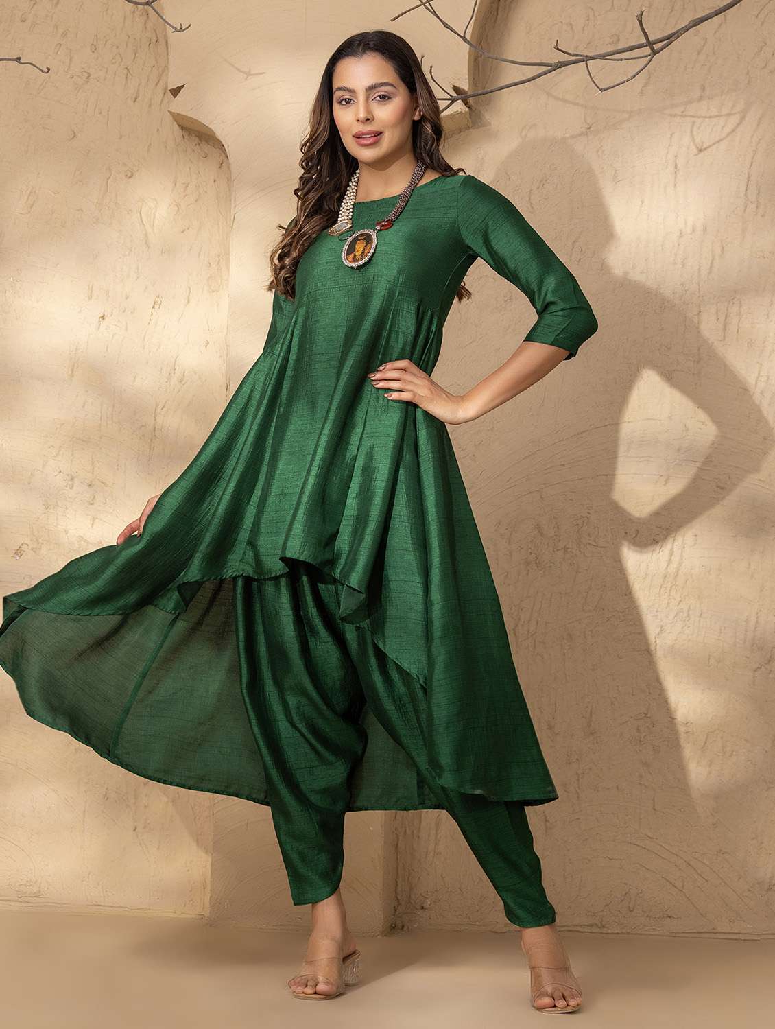 women solid dhoti and high-low kurta set
