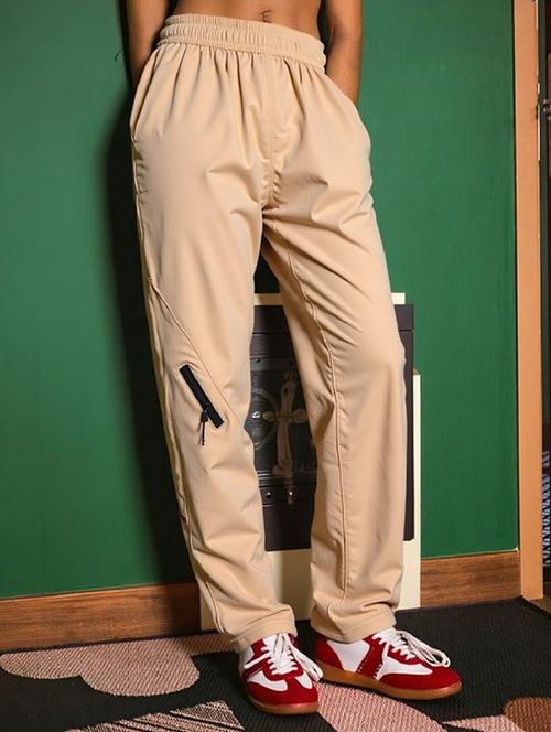 women solid mid rise parachute pants - 22035200 - Standard Image - 0