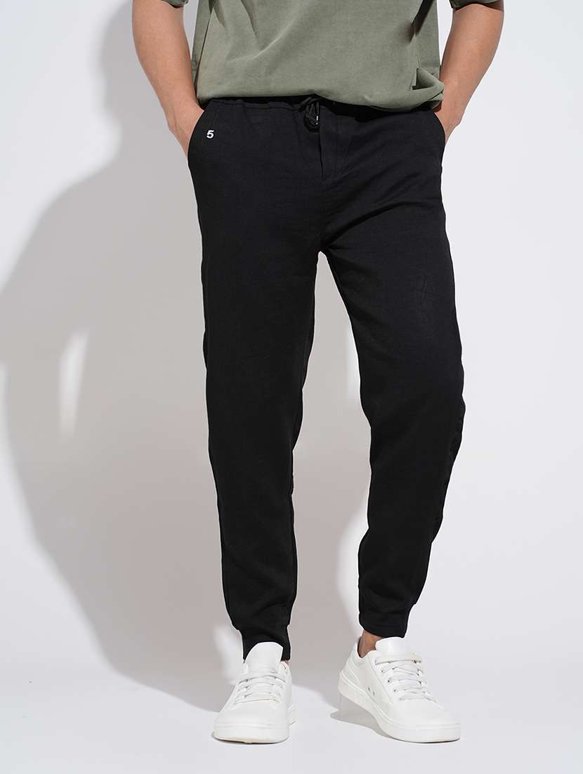 men black solid mid rise regular fit jogger - 22038073 -  Zoom Image - 0