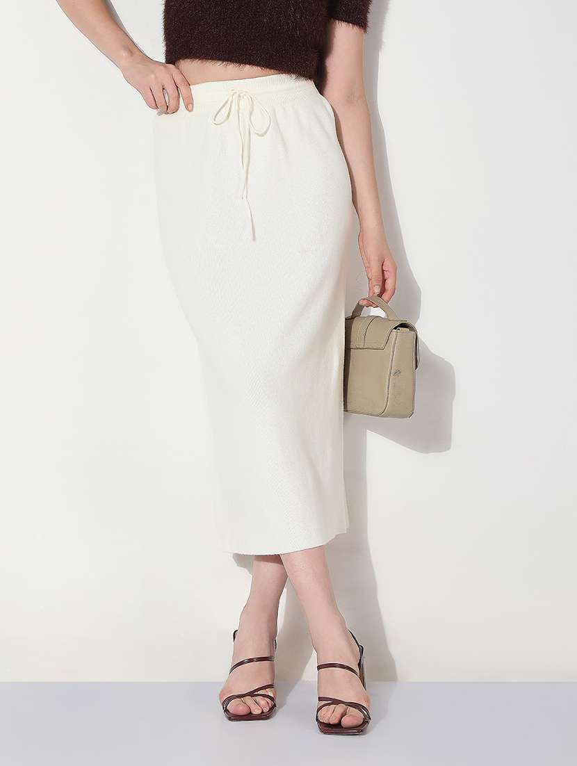 women white solid straight skirt - 22038283 -  Zoom Image - 0