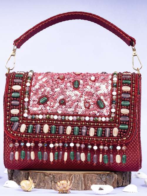 women embellished clutche