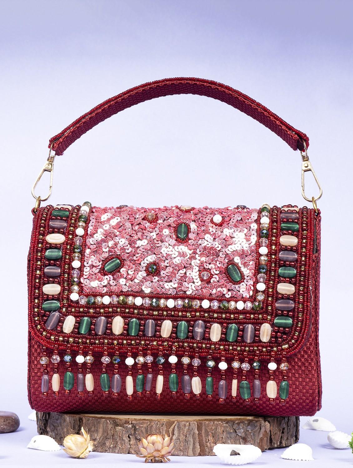 women embellished clutche