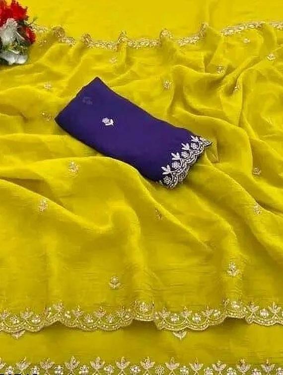 women solid with work embroidered saree with blouse