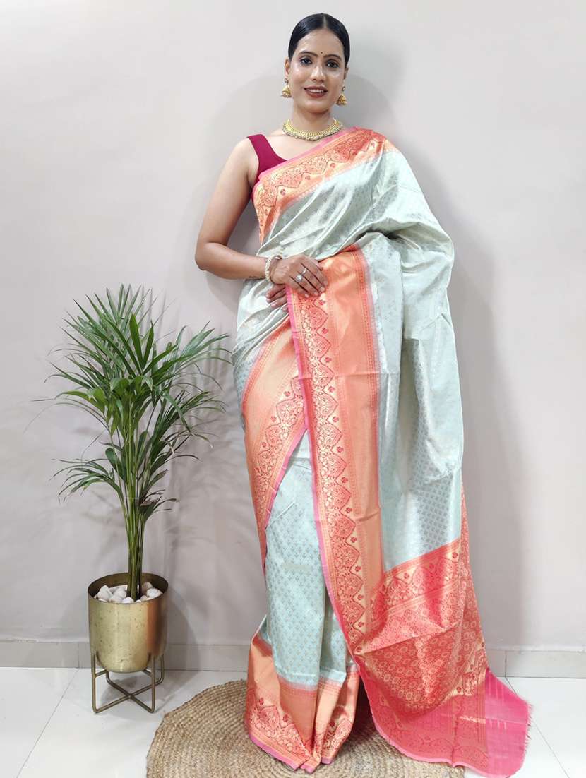 women self design banarasi saree with blouse