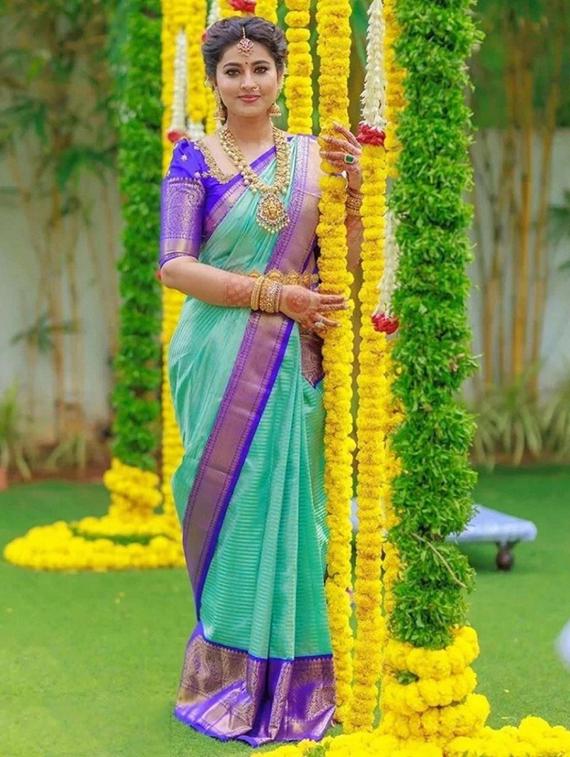 women self design kanjivaram saree with blouse