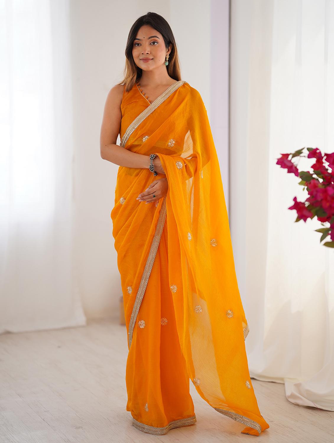 women solid with work embellished saree with blouse