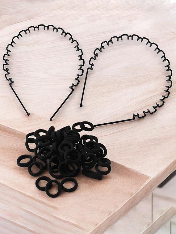 pack of black rubber bands and spiral hair band