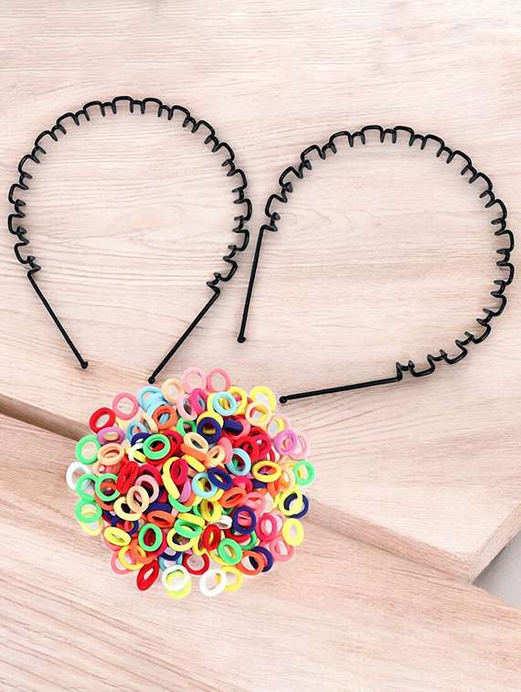 pack of multicolored rubber bands and spiral hair band