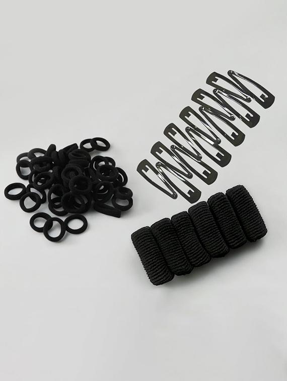 pack of black rubber bands and hair clips