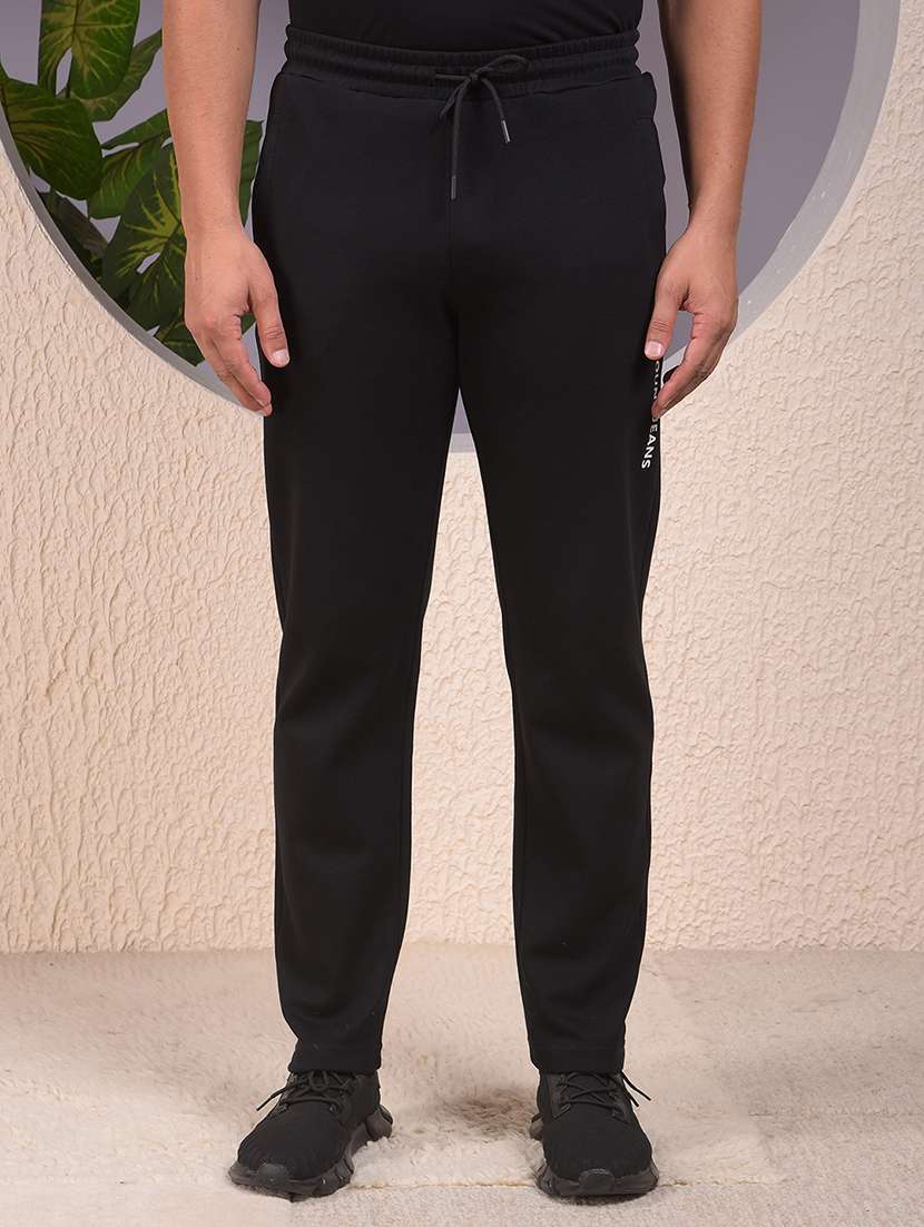 men solid mid rise full length track pant - 22053982 -  Zoom Image - 0