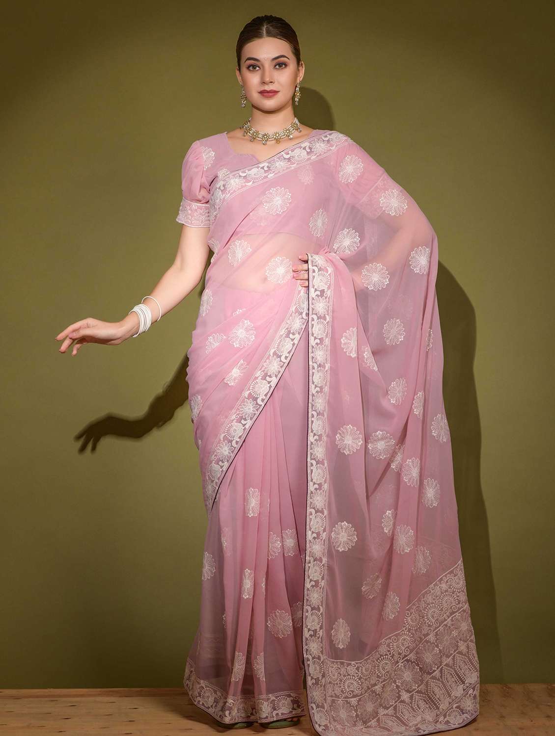 women solid with work embroidered saree with blouse