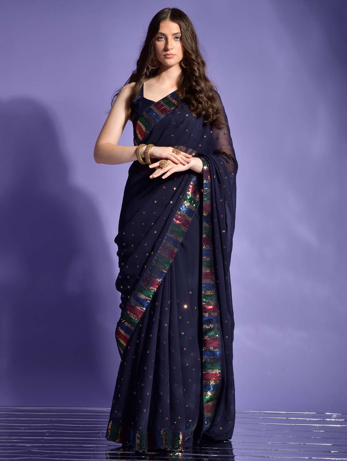 women solid with work embellished saree with blouse