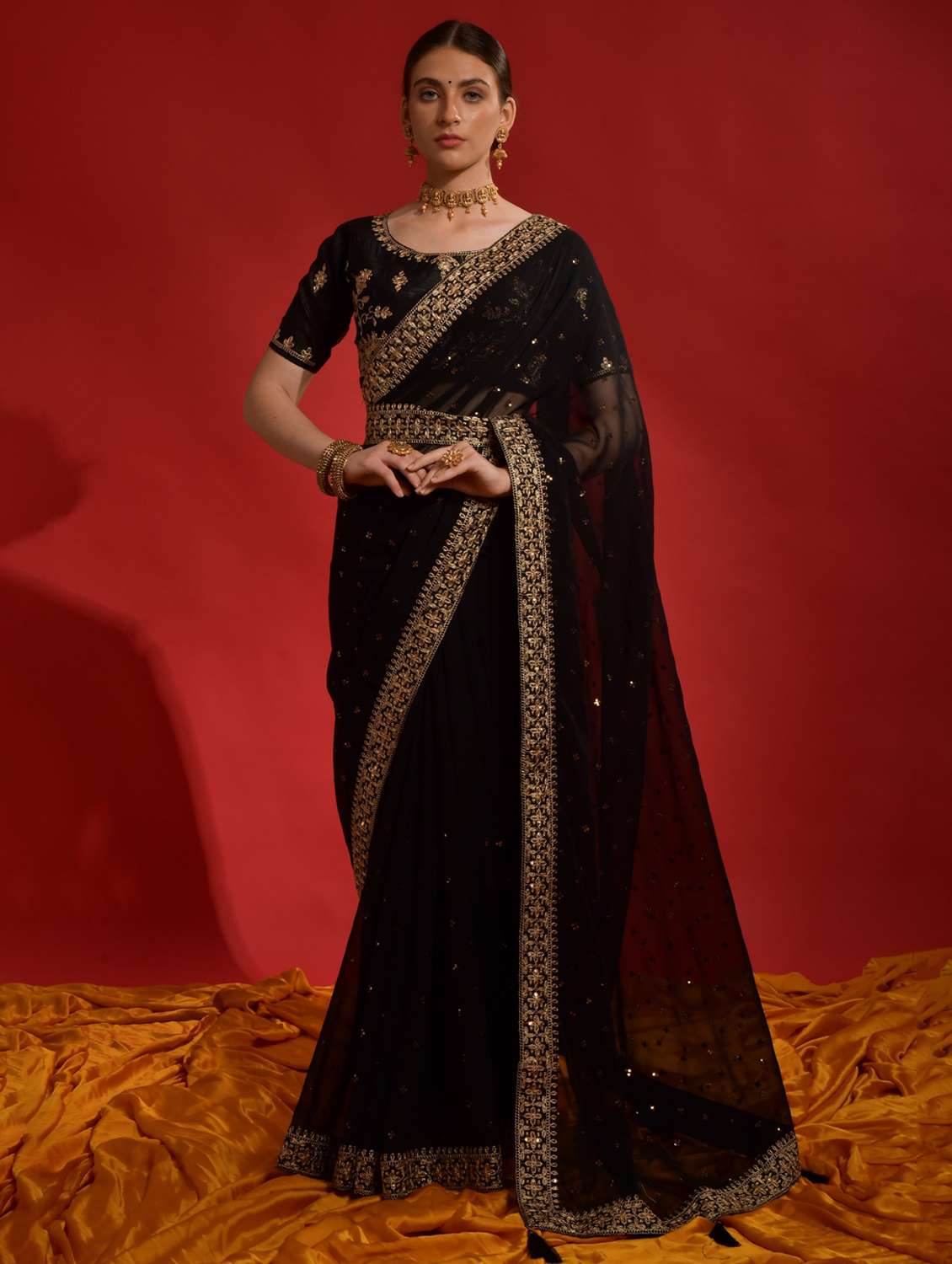 women solid with work embellished saree with blouse