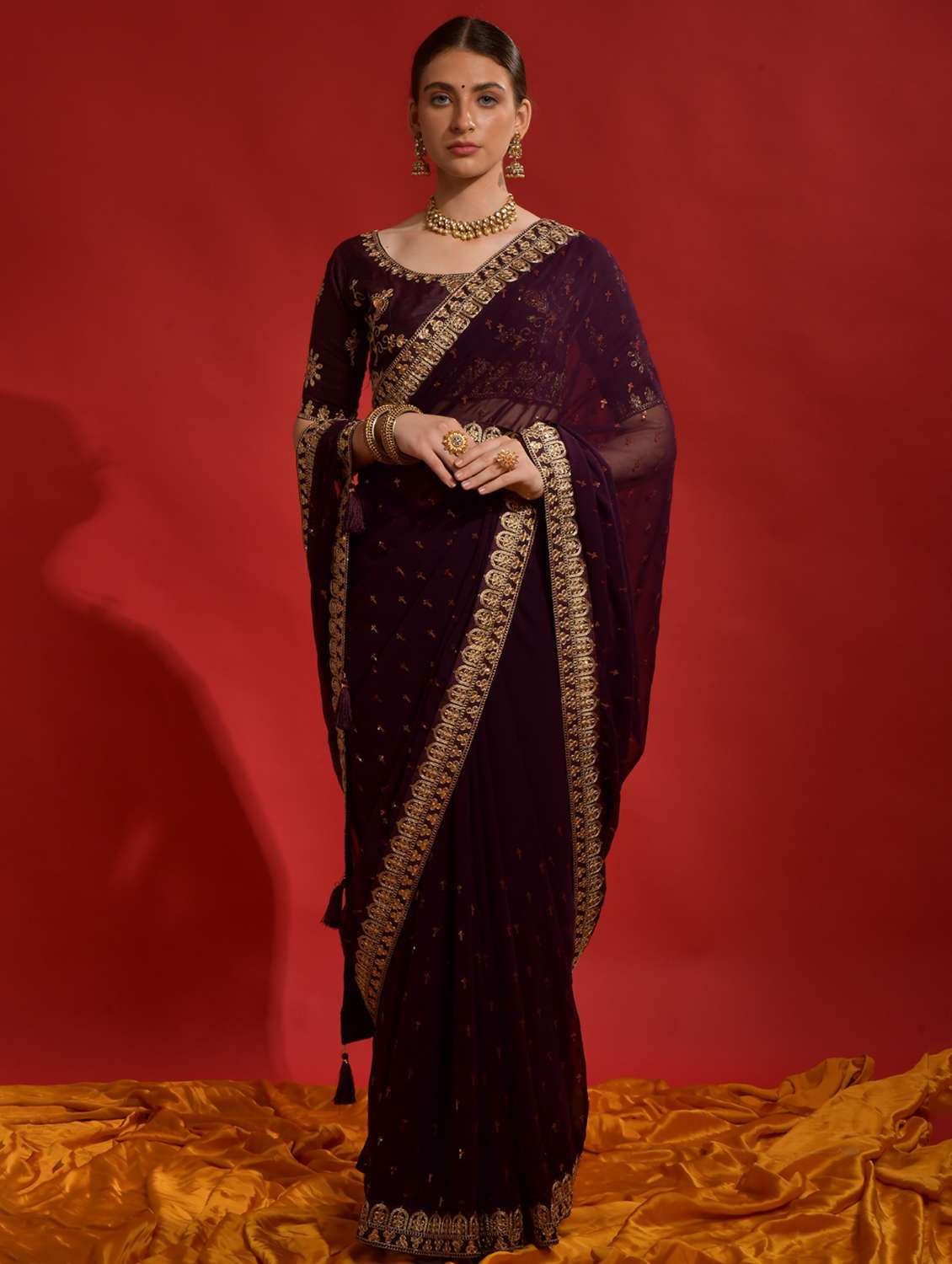 women solid with work embellished saree with blouse