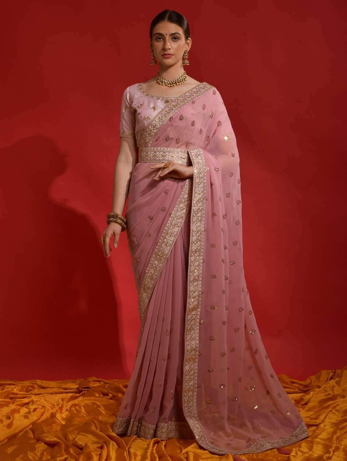 women solid with work embroidered saree with blouse