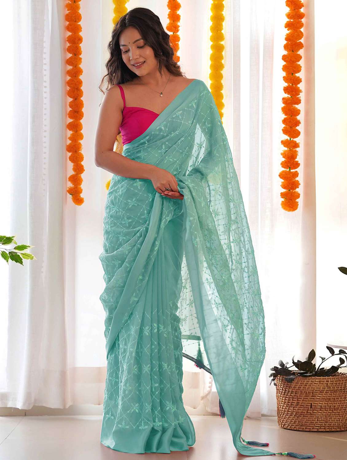 women solid with work embroidered saree with blouse