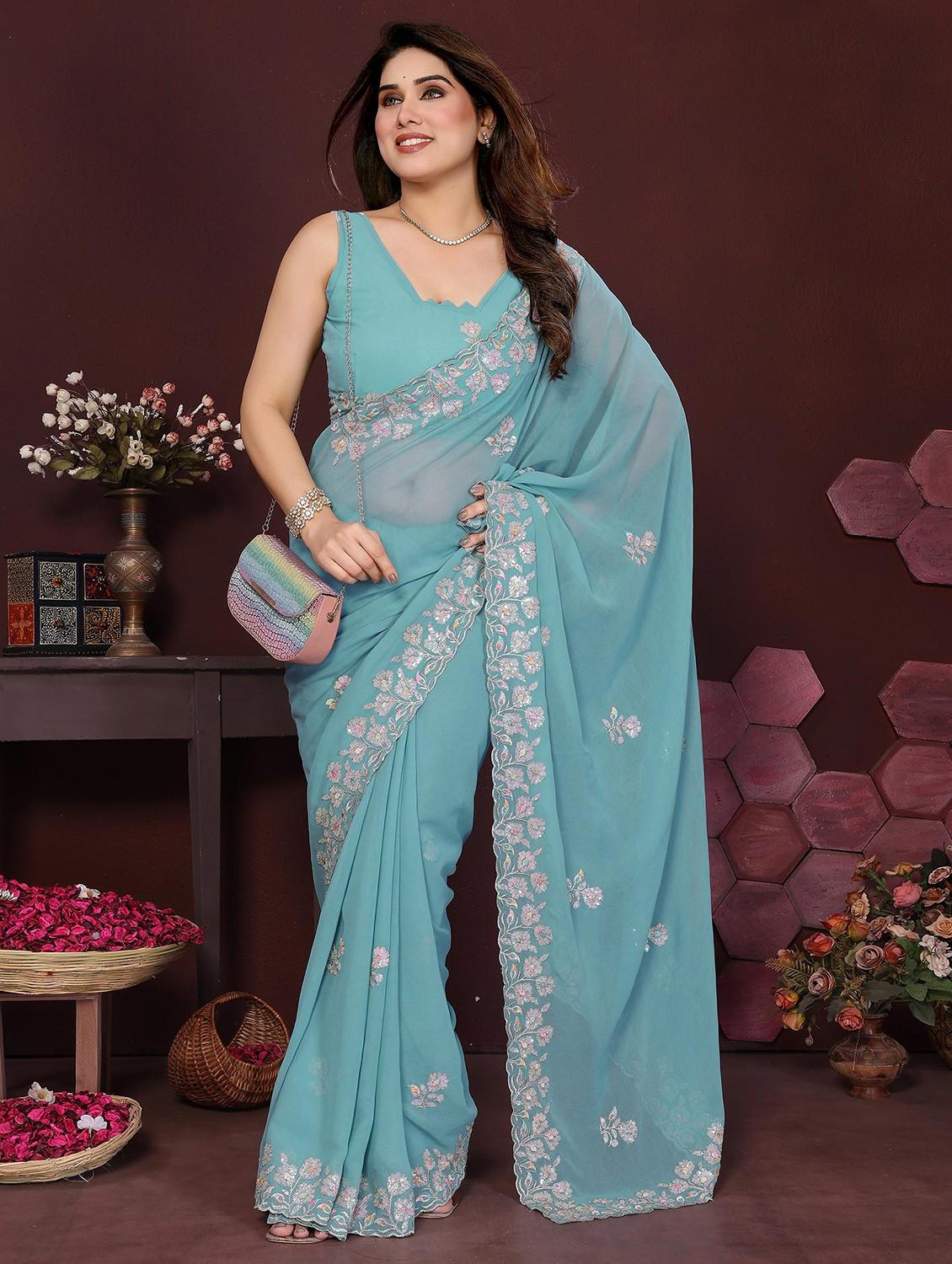 women solid with work embroidered saree with blouse