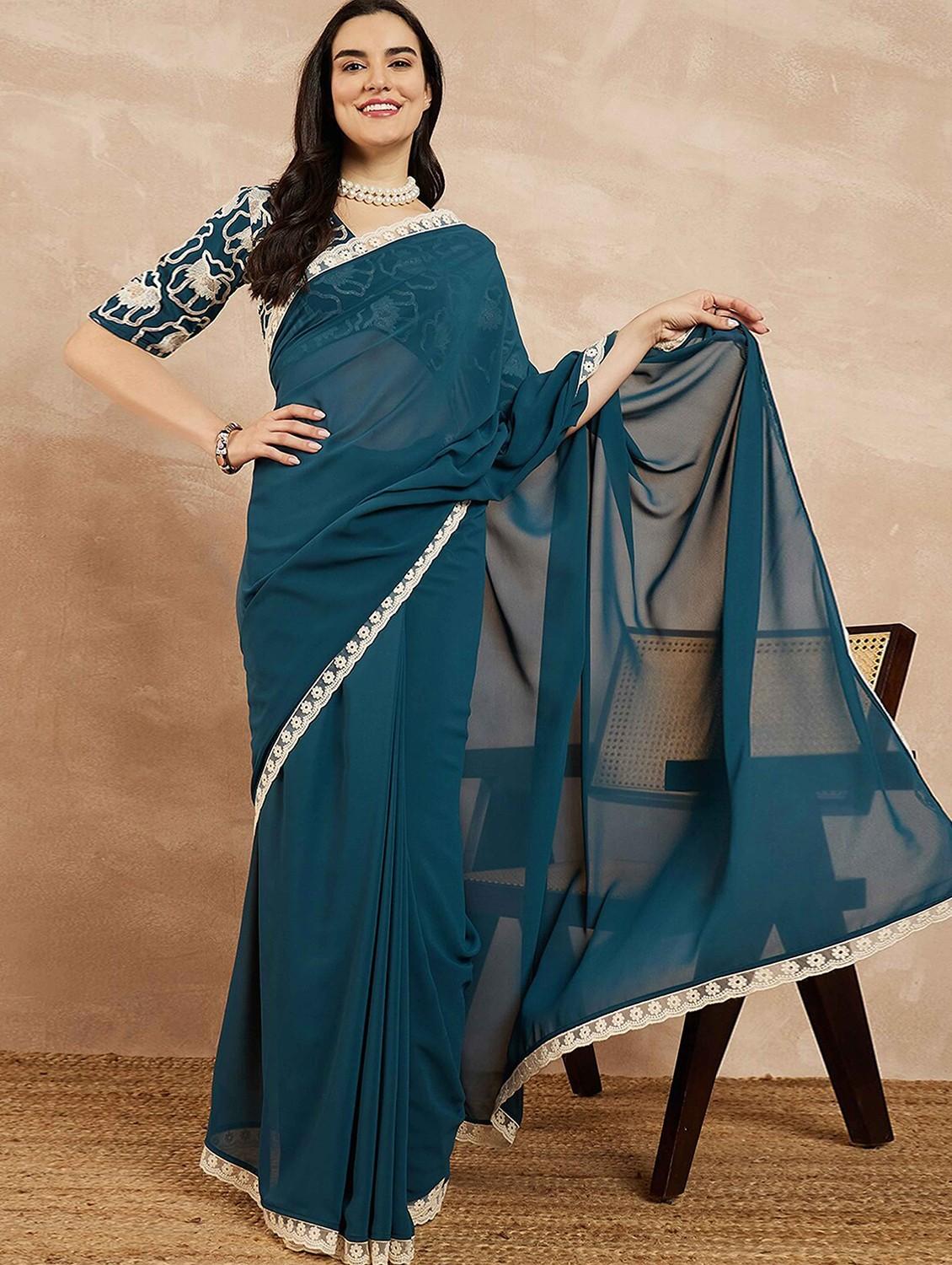 women solid with bordered saree with blouse