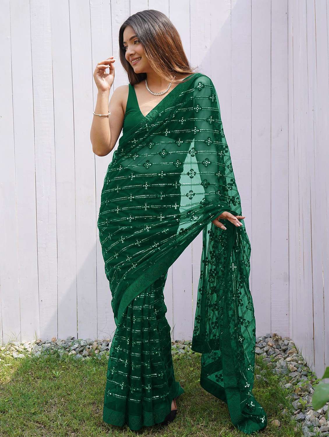 women solid with work embellished saree with blouse
