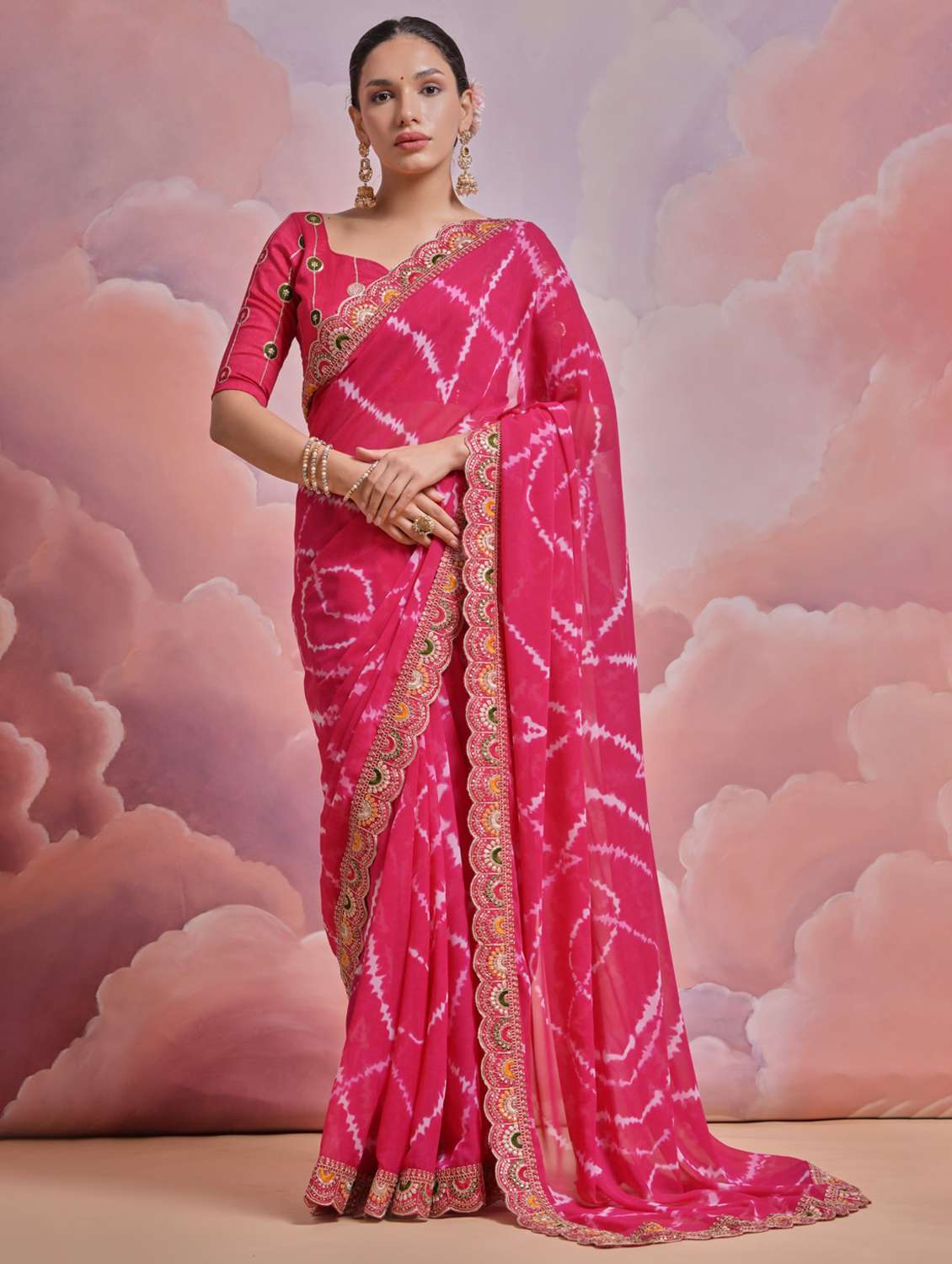 women tie & dye printed bordered saree with blouse - 22063029 -  Zoom Image - 0