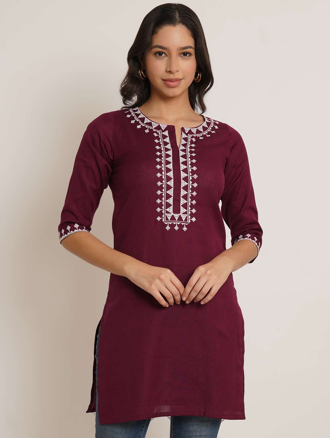women solid wiith work sleeveless straight kurti