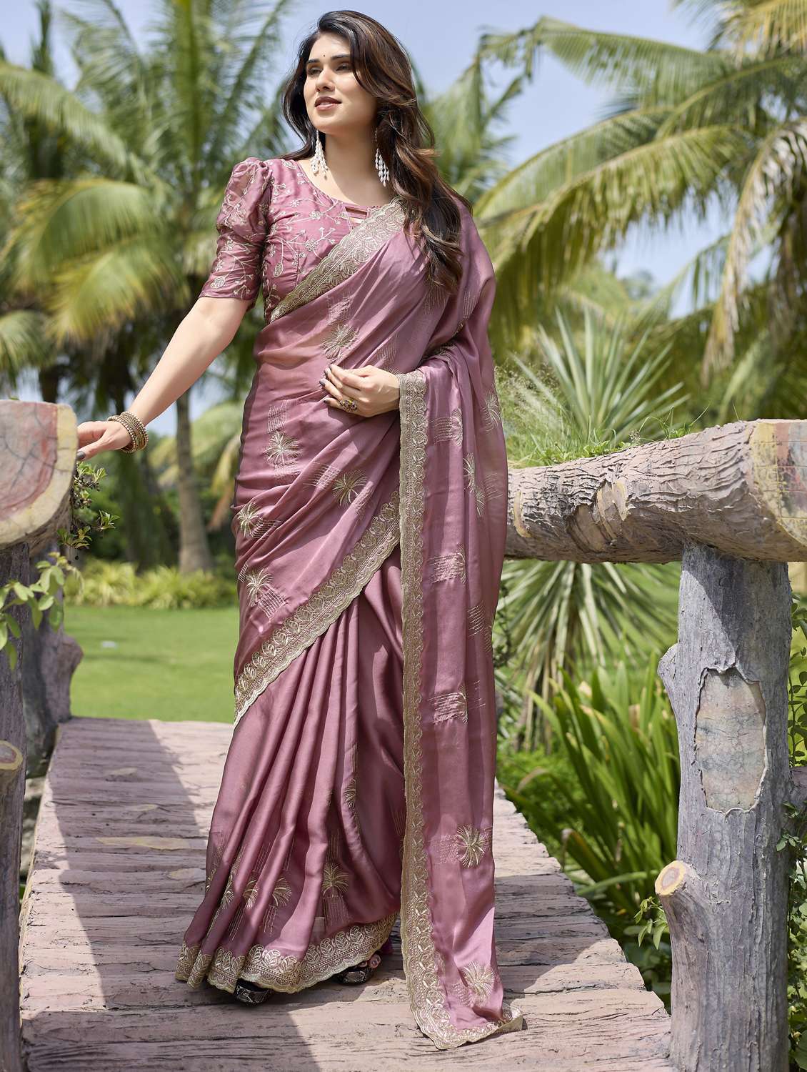 women solid with work embroidered saree with blouse