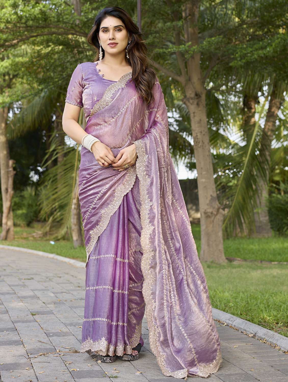 women solid with work embroidered saree with blouse