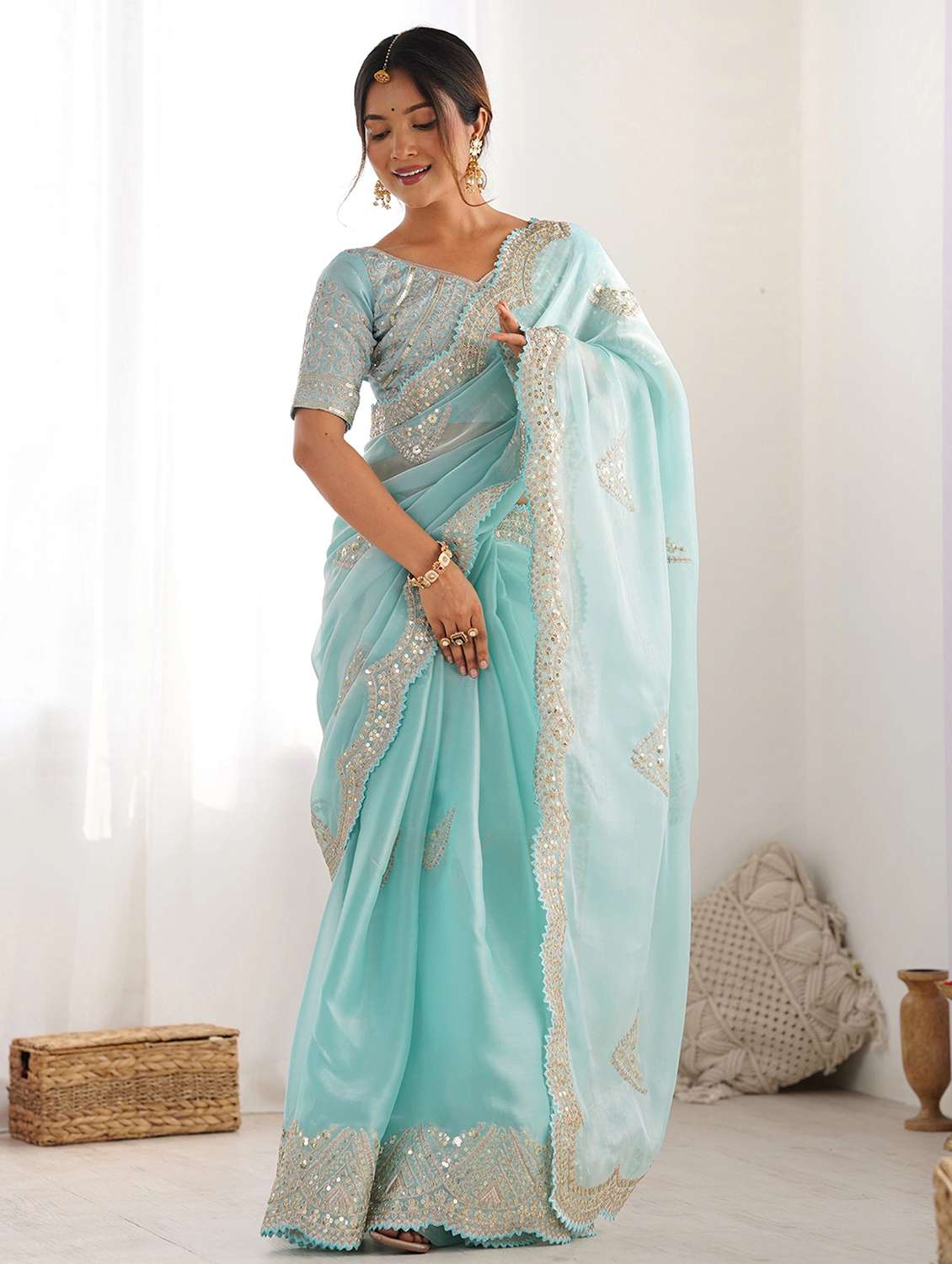 women solid with work embroidered saree with blouse