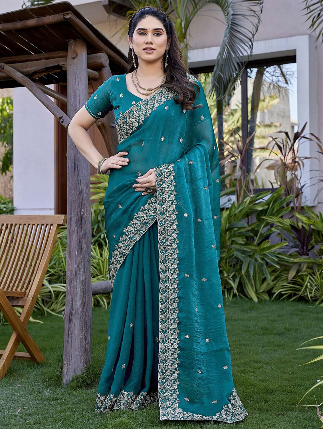 women solid with work embroidered saree with blouse