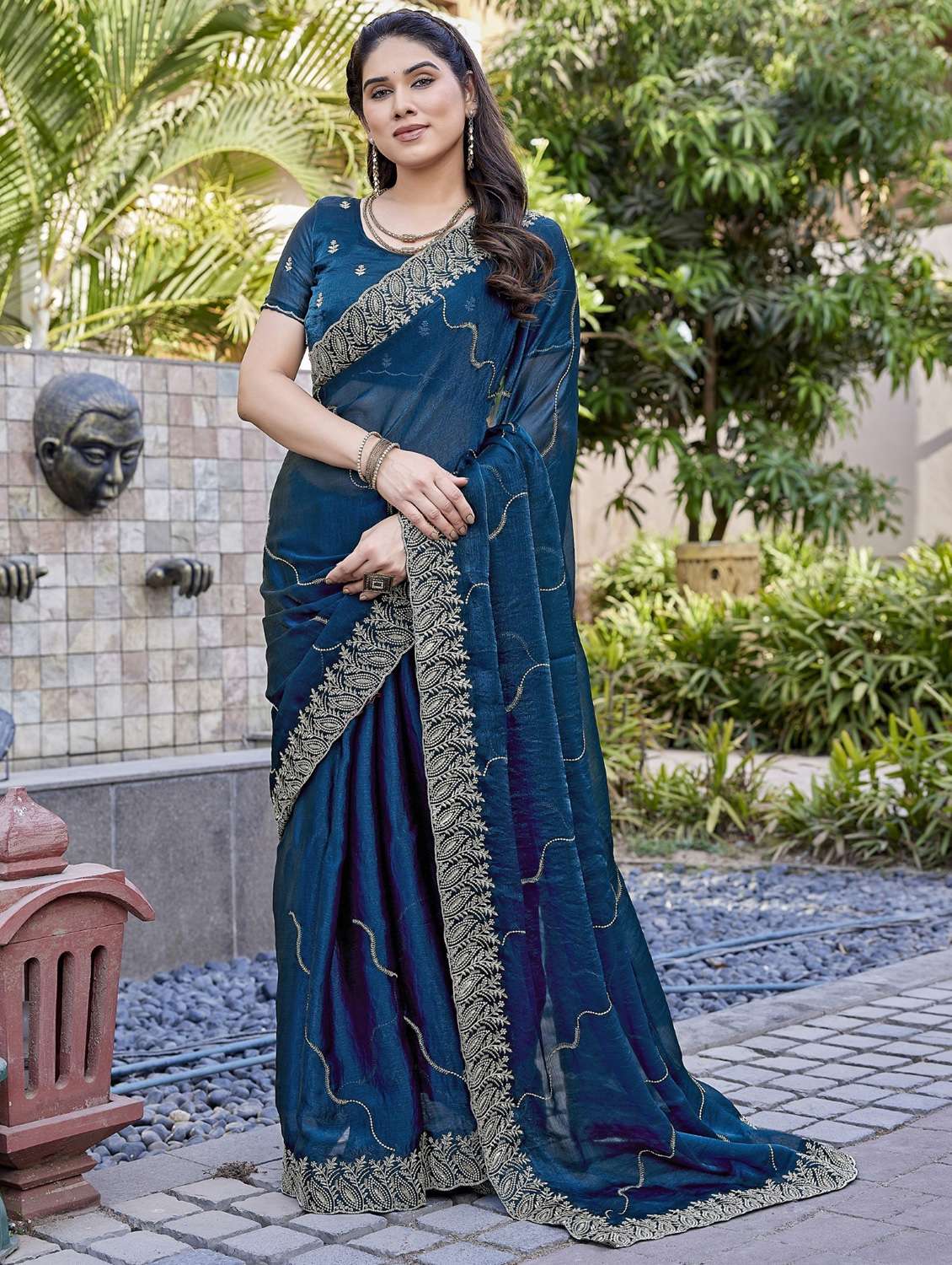 women solid with work embroidered saree with blouse