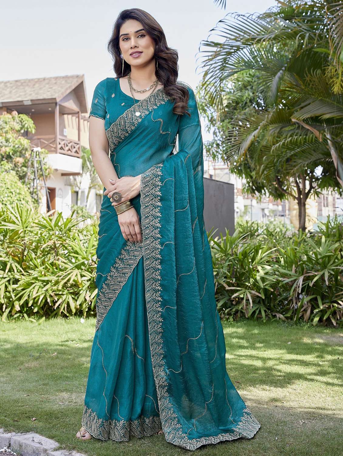 women solid with work embroidered saree with blouse