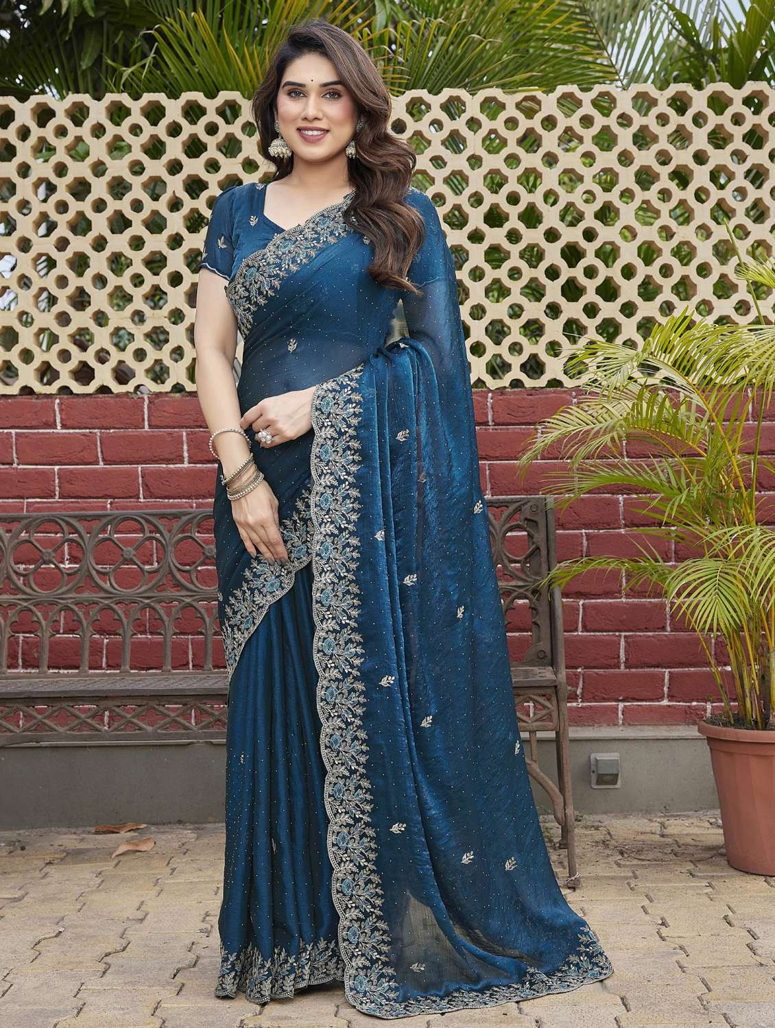 women solid with work embroidered saree with blouse