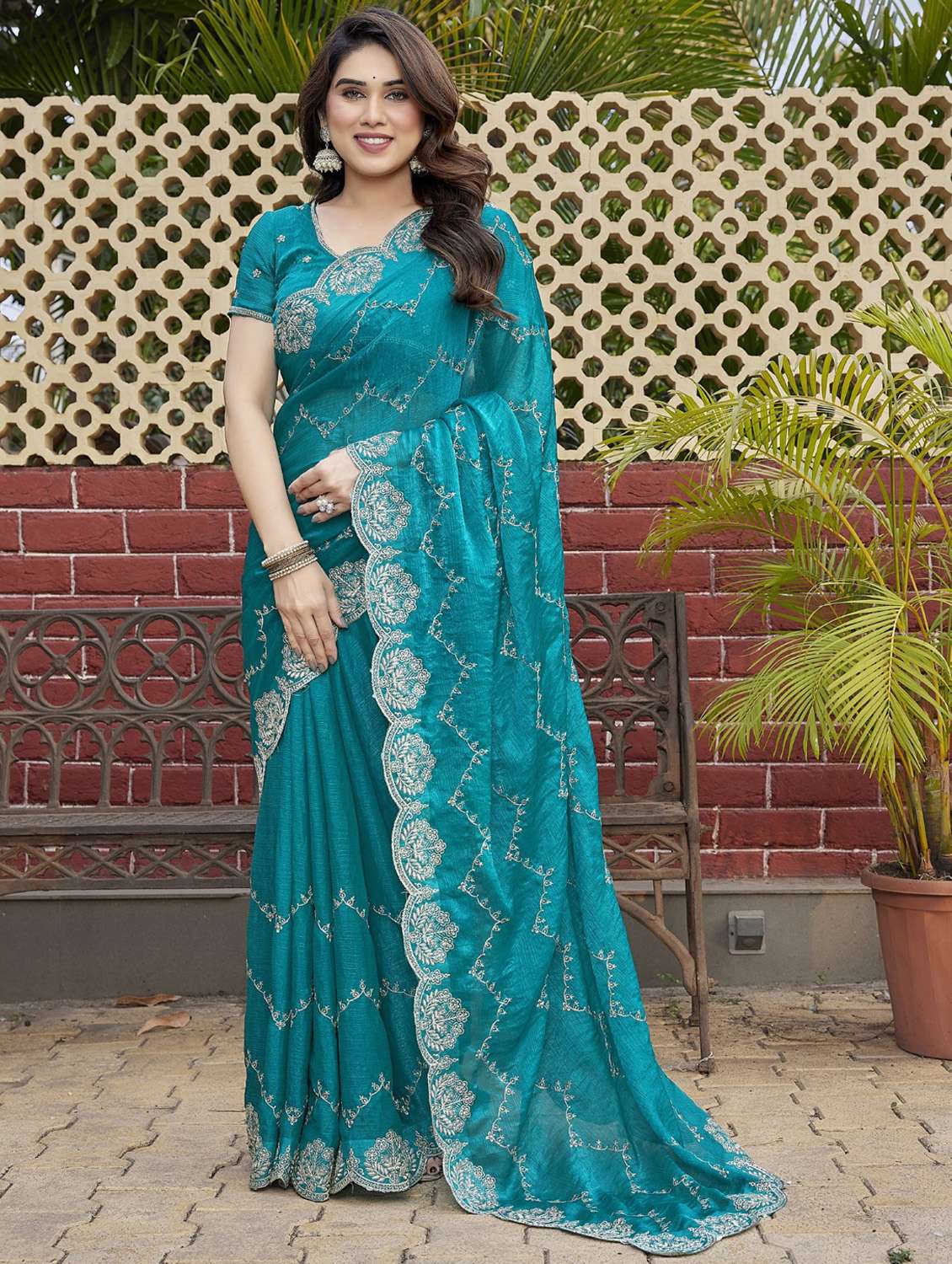 women solid with work embroidered saree with blouse