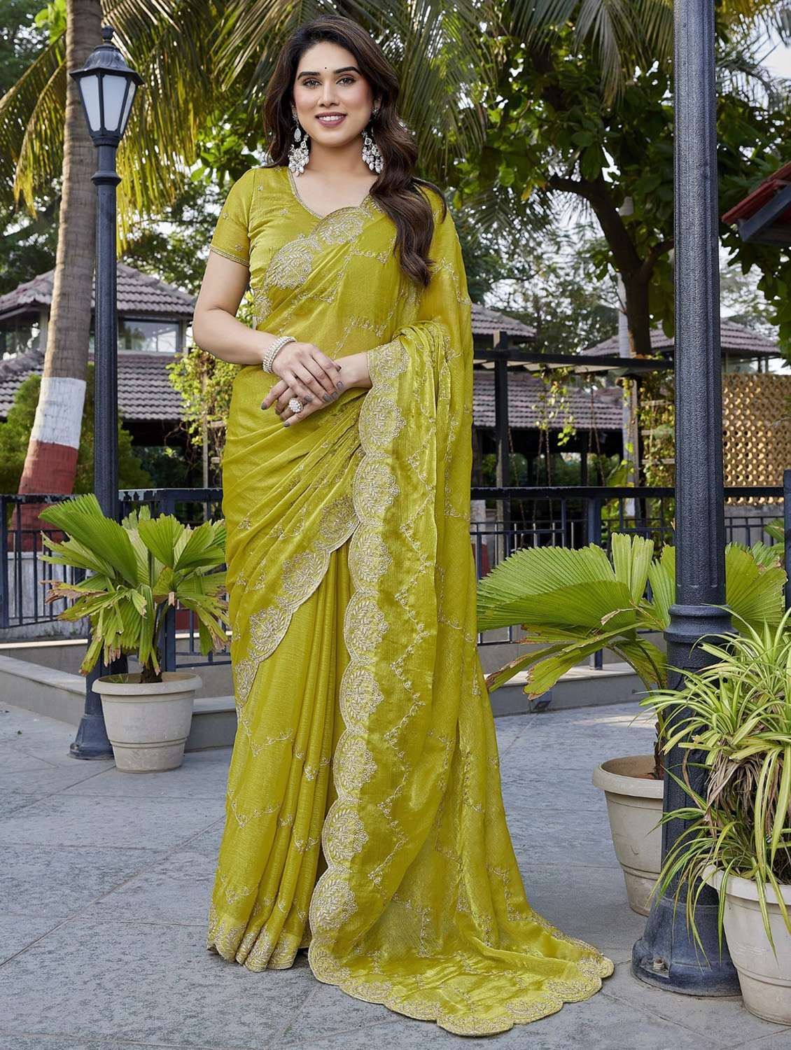 women solid with work embroidered saree with blouse - 22066146 - Zoom Image - 0