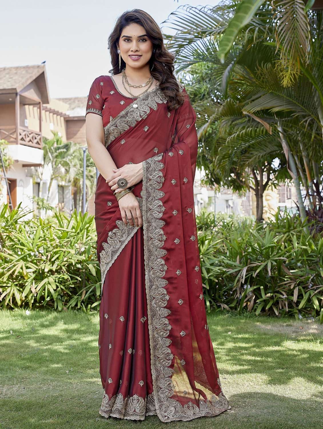 women solid with work embroidered saree with blouse