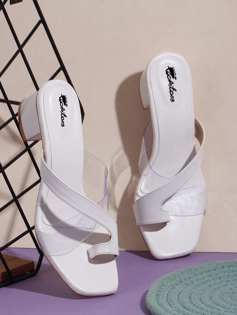 white synthetic sandals