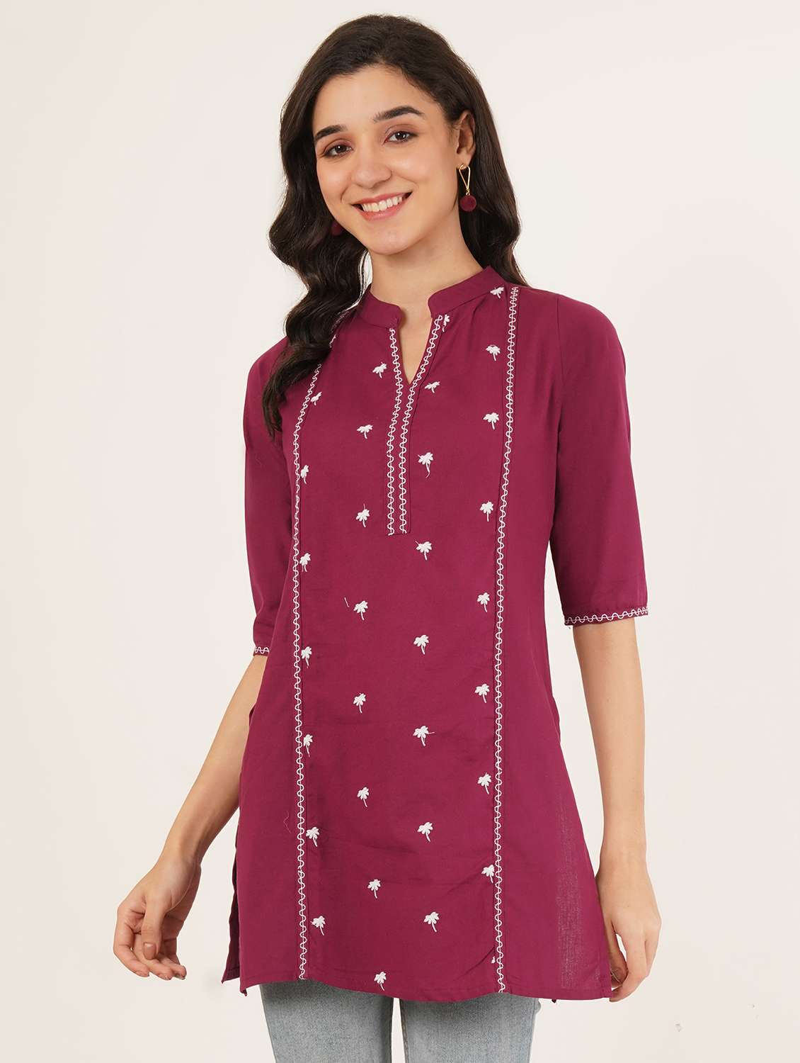 women embroidered three quarter sleeve straight kurti
