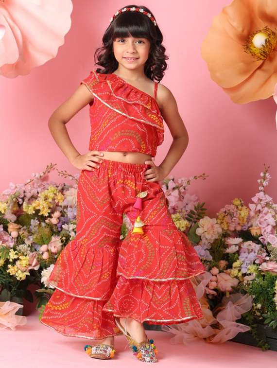 girls bandhani print sleeveless top and sharara pant set