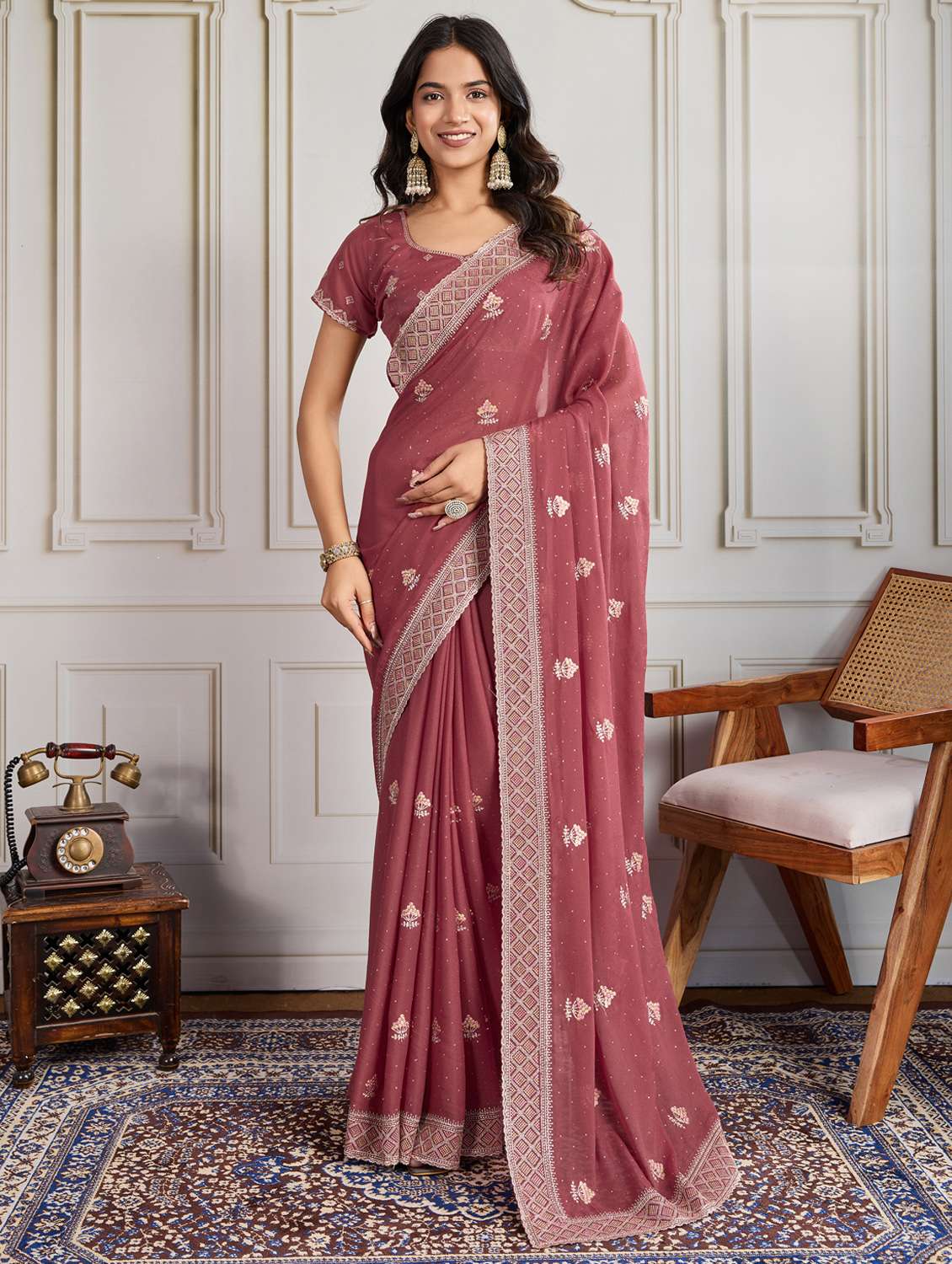 women solid with work embroidered saree with blouse
