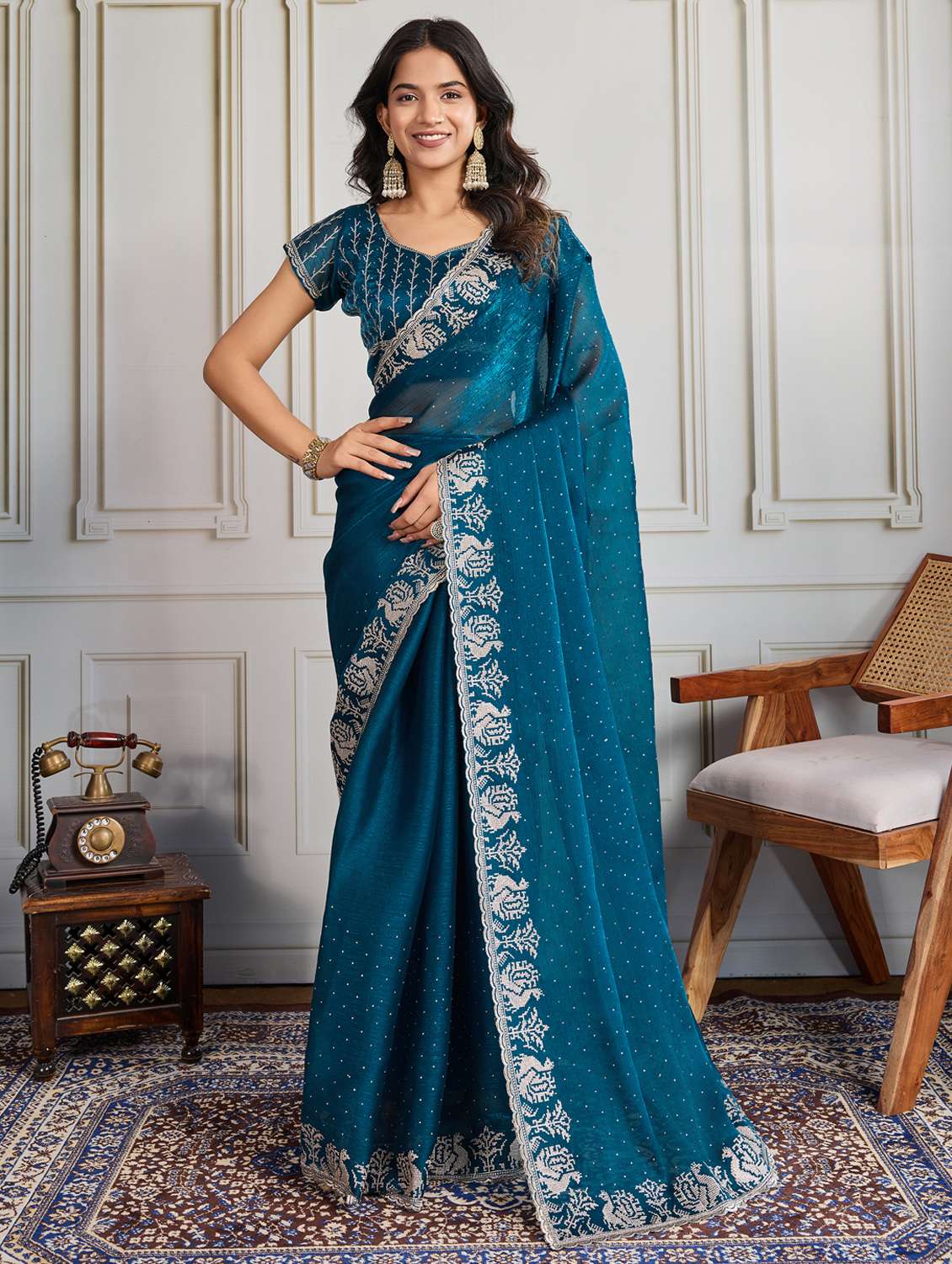 women solid with work embroidered saree with blouse