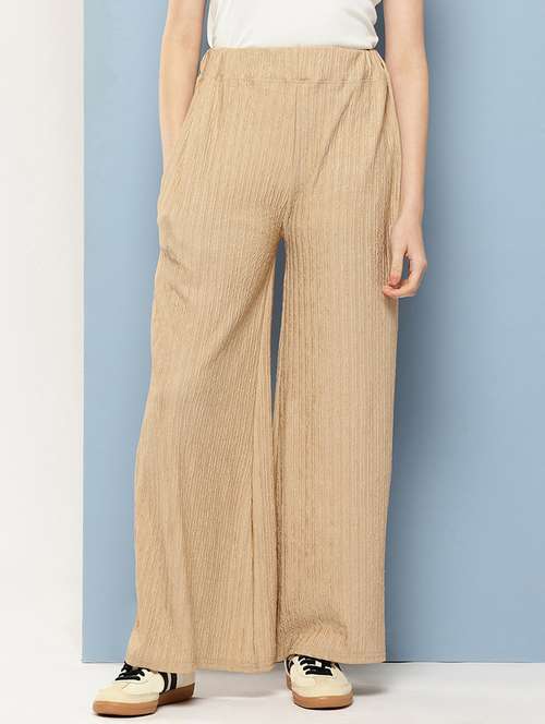 women solid mid rise flared palazzo - 22074043 -  Standard Image - 0