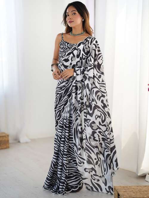 women printed casual wear saree with blouse - 22074528 -  Standard Image - 0