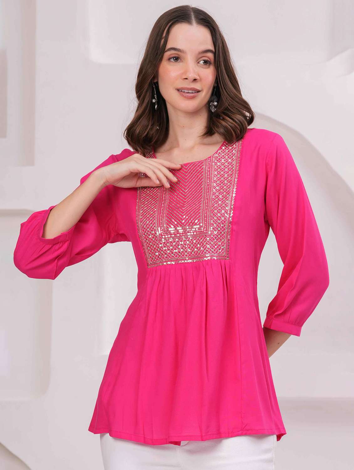 women embroidered three quarter sleeve kurti