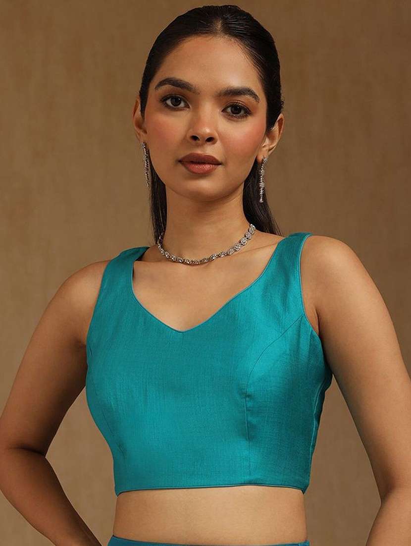 women solid sleeveless stitched blouse