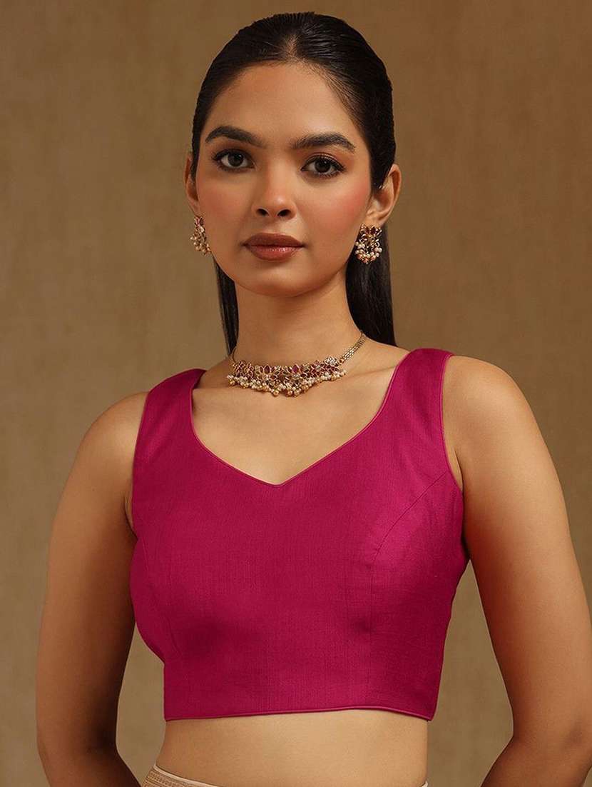 women solid sleeveless stitched blouse