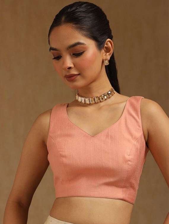 women solid sleeveless stitched blouse